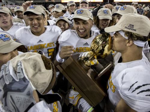 KJ kisses the trophy