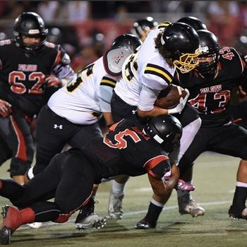 Sultan Moala cuts down a ball carrier